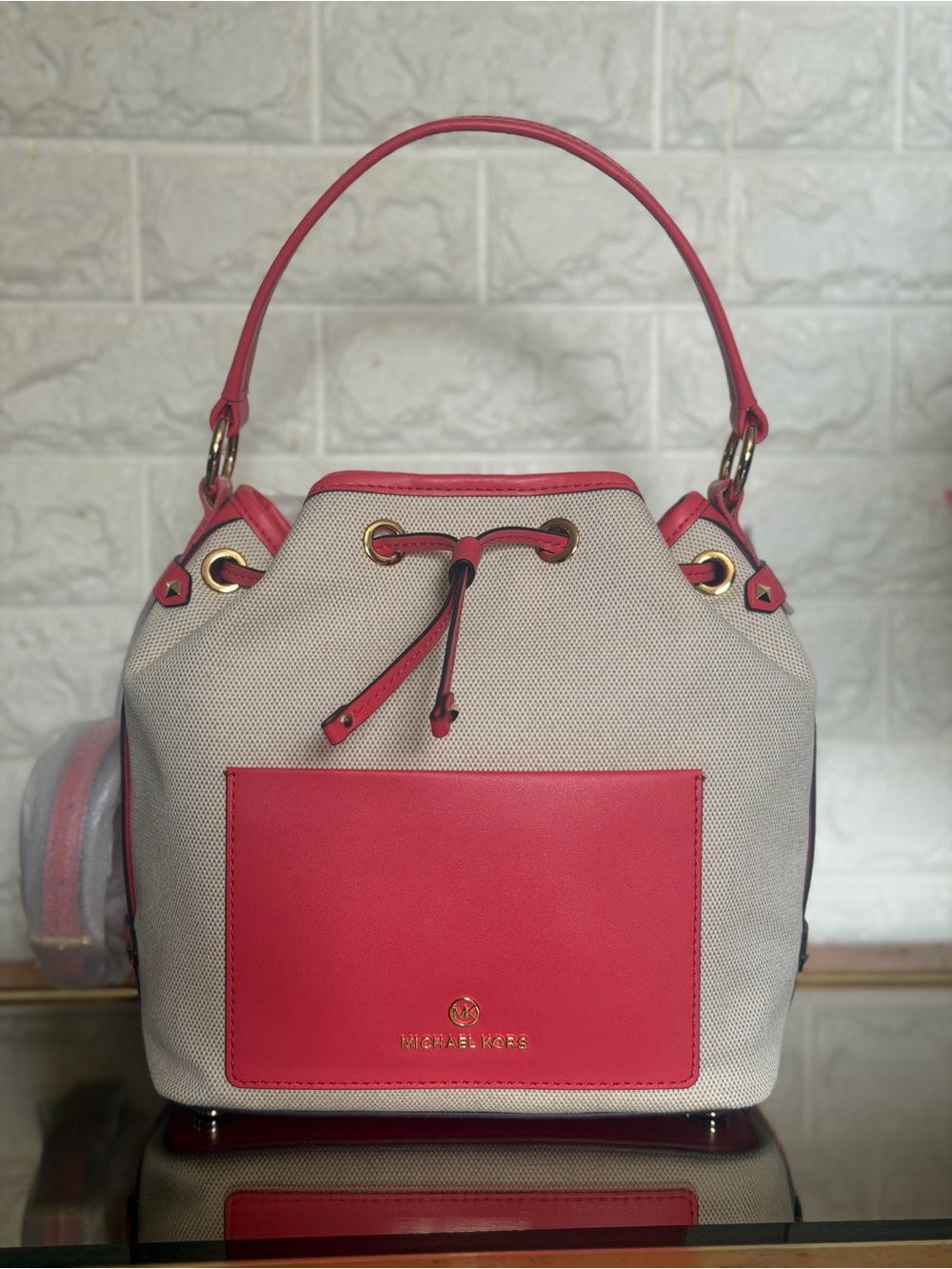 Michael Kors Beige Bucket Bag with Pink Trim